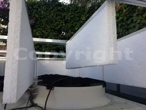 Silenzio Sovrano: Barriere Acustiche da Giardino per Domare il Rumore delle UTA
